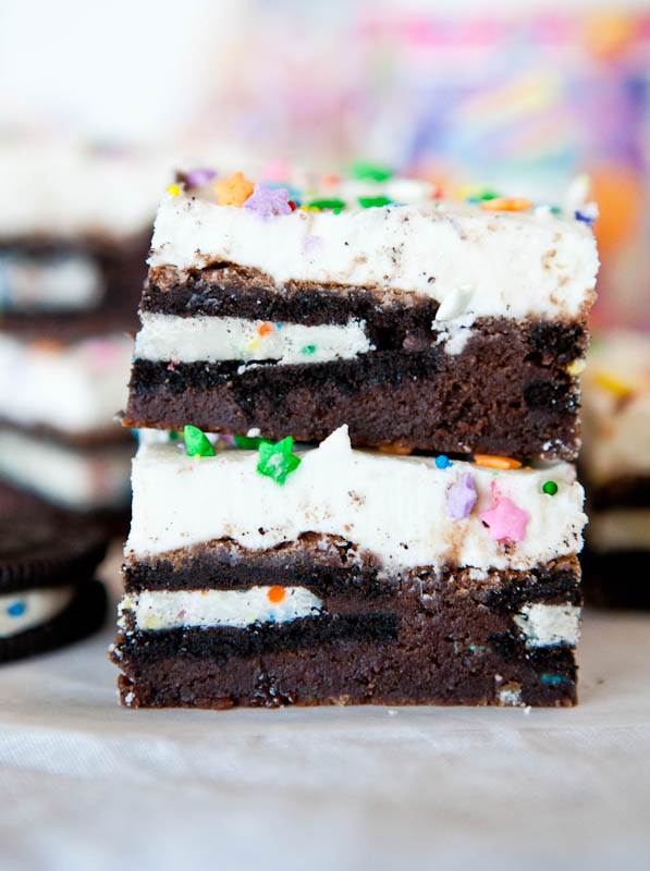 Two stacked Oreo Cookie-Stuffed Brownies with Vanilla Buttercream Frosting