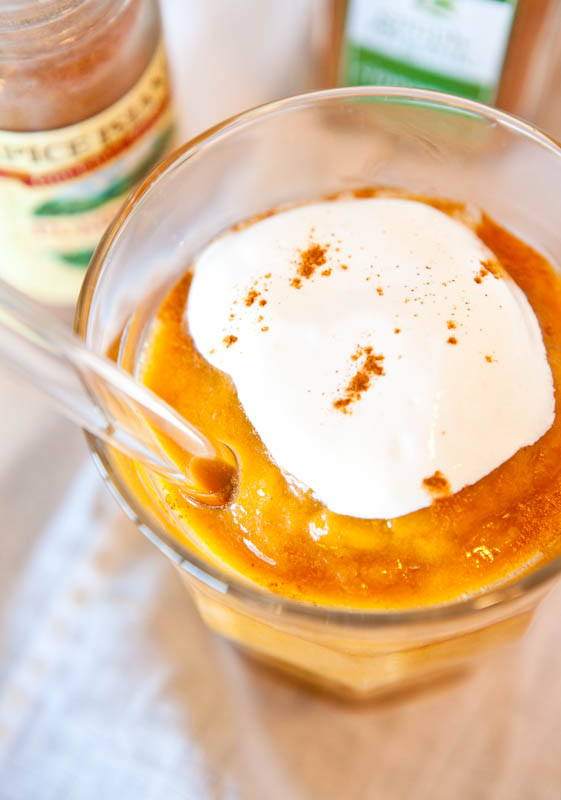 Close up of whipped cream and cinnamon topped Caramel Maple Pumpkin Pie Smoothie
