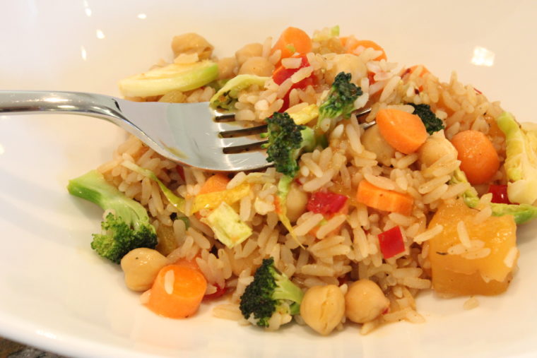 Mango Balsamic Rice, Beans & Mixed Veggies in white dish with fork