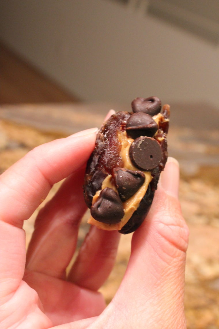Dates stuffed with peanut butter and chocolate chips
