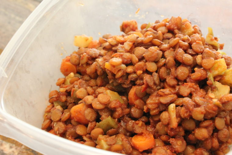 Leftover Chipotle Salsa Lentils with Mixed Vegetables in clear container