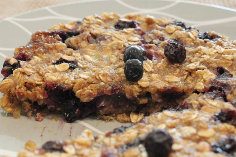 Microwave Blueberry Banana Oat Cake on plate showing inside of cake