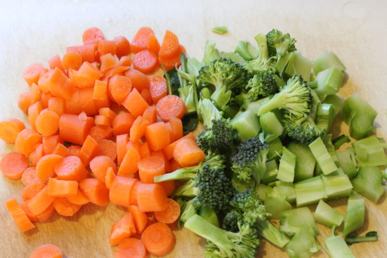 Chopped vegetables on cutting board