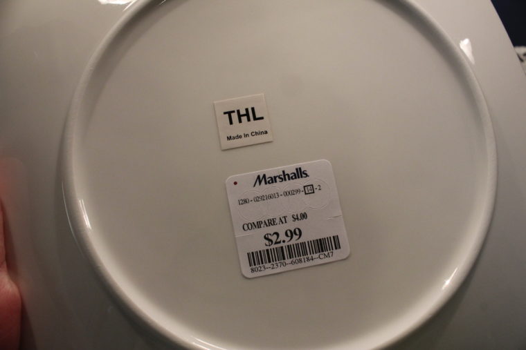 Bottom of white dish showing price tag