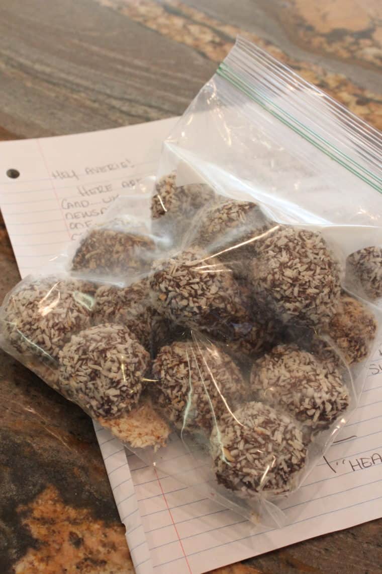 Bag full of coconut covered balls and a note