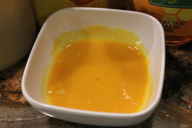 Creamy Homemade Honey Mustard Dressing in white dish
