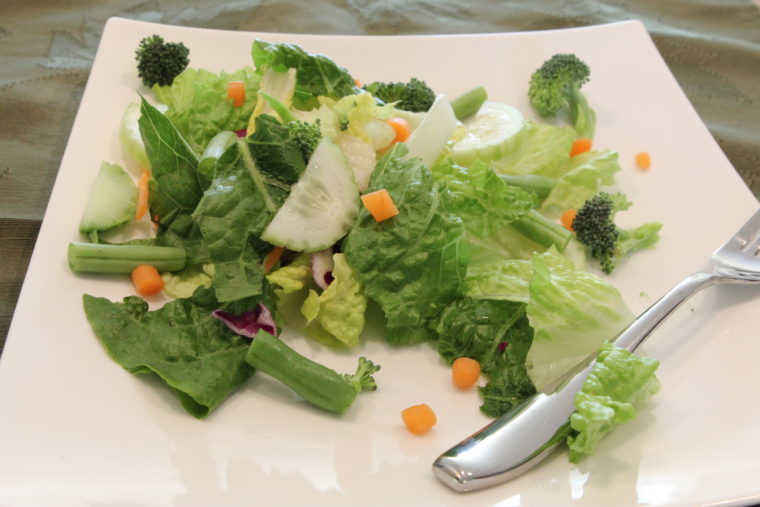 Side of salad on plate