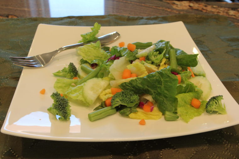 Salad on plate with fork