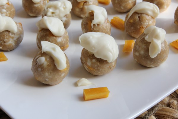 Side of No-Bake White Chocolate & Mango Cookie Dough Bites on plate