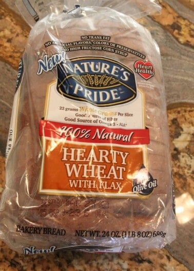 Loaf of Nature's Pride Hearty Wheat Bread with Flax