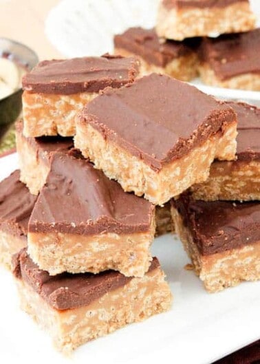 Stacked No-Bake Nutter Butter Special K Bars on white plate