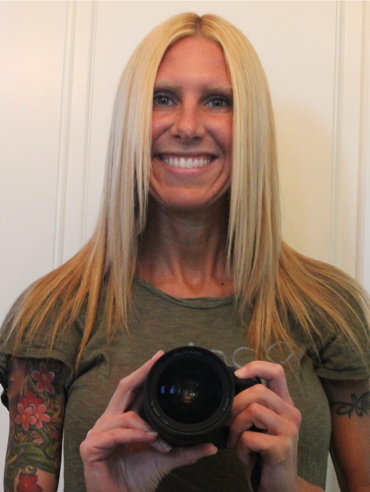 Woman taking photo of self smiling