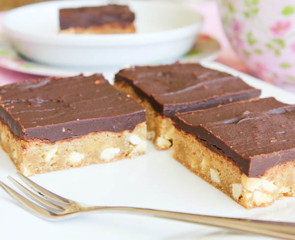 White Chocolate Blondies with Chocolate Peanut Butter Frosting with fork