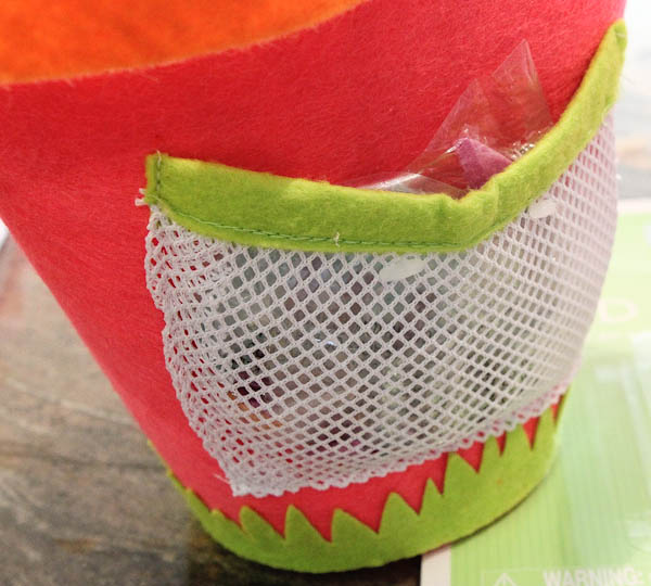 stick on clothes in side pouch of dress-up basket