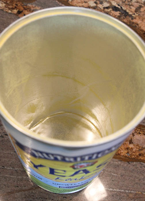 empty can of nutritional yeast flakes
