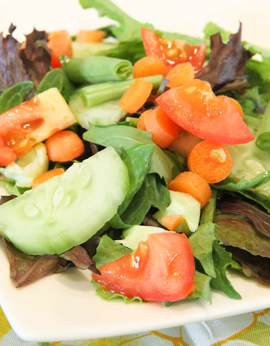 Salad with snap peas tomatoes and cucumber