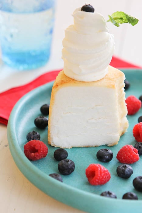 Angel Food Cake with whipped cream and berries