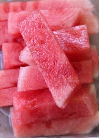Stacked slices of fresh watermelon.
