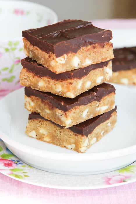 Stack of White Chocolate Blondies with Chocolate Peanut Butter Frosting