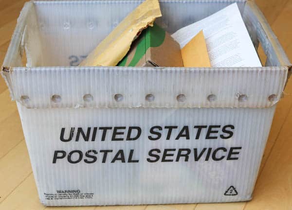 Box of US Postal Service mail