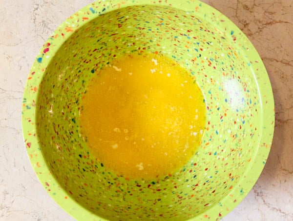 Butter melted inside green bowl