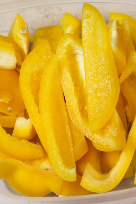 Sliced Yellow Peppers in container