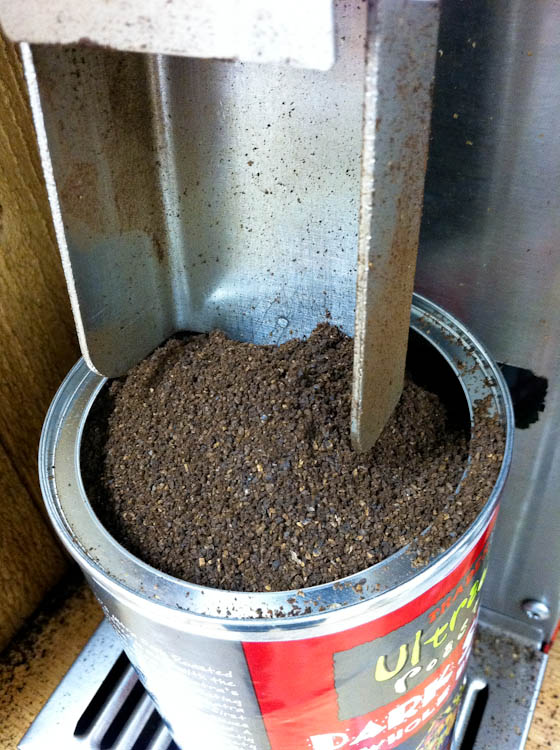 Coffee chute leading into coffee can