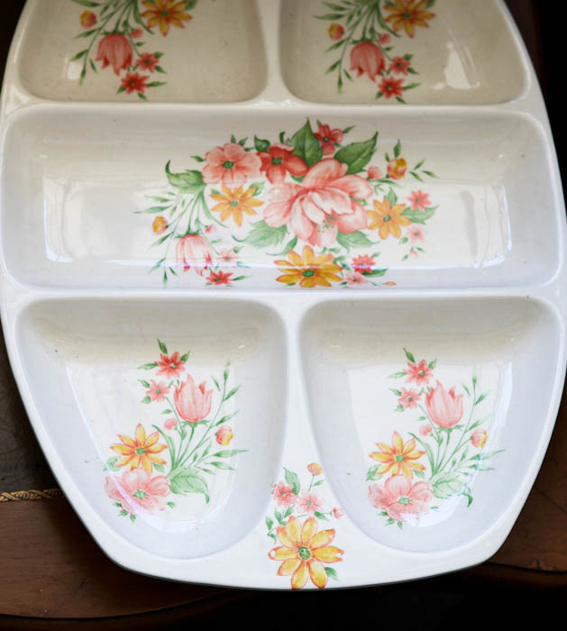 divided dish with floral patterns in each section