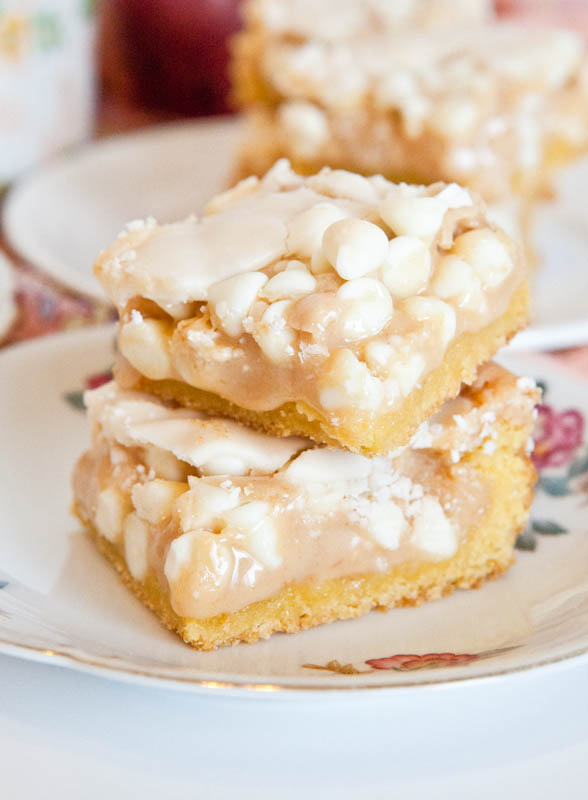 Two stacked White Chocolate Vanilla Marshmallow Cake Bars on plate 