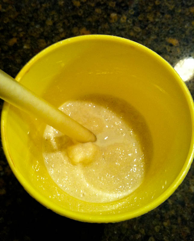 Baileys slushie in yellow cup with straw