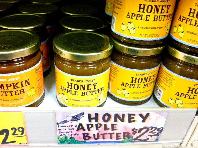 Jars of honey apple butter on the shelf