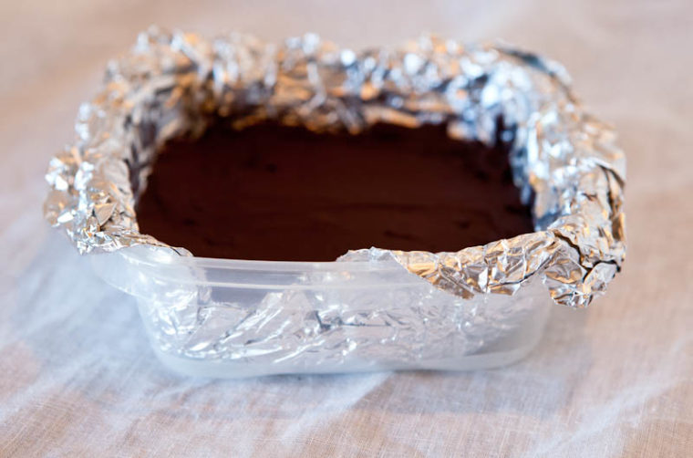 Plastic container lined with foil with butterfinger bars inside