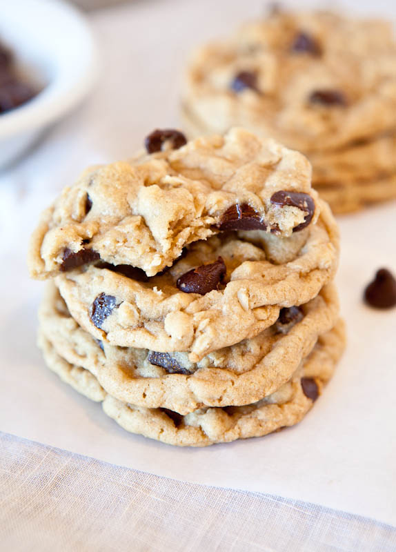 Chocolate chip peanut butter oatmeal cookies stacked with chocolate chip scattered