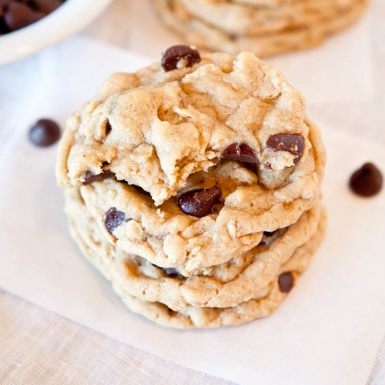 Chocolate chip peanut butter oatmeal cookies stacked with chocolate chip scattered