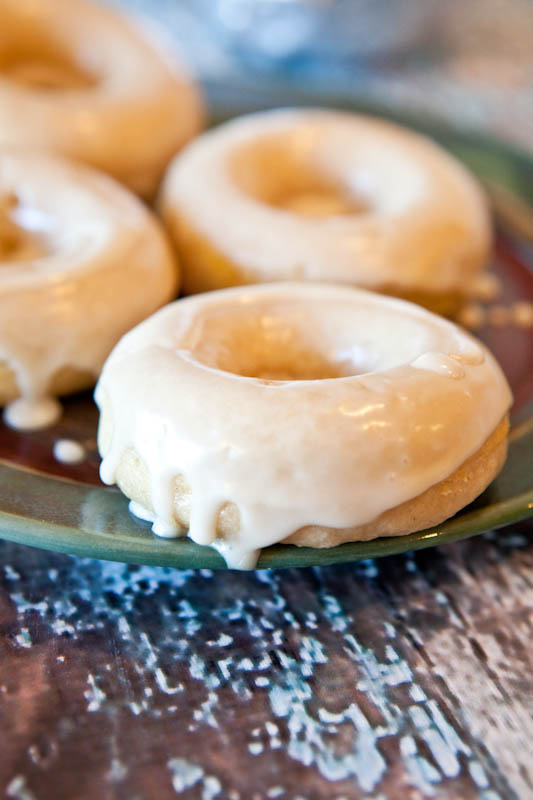 Baked Vanilla Glazed Donuts — Slightly dense and cake-like, these vanilla glazed donuts are baked rather than fried. Perfect for weekend brunches and special occasion breakfasts!