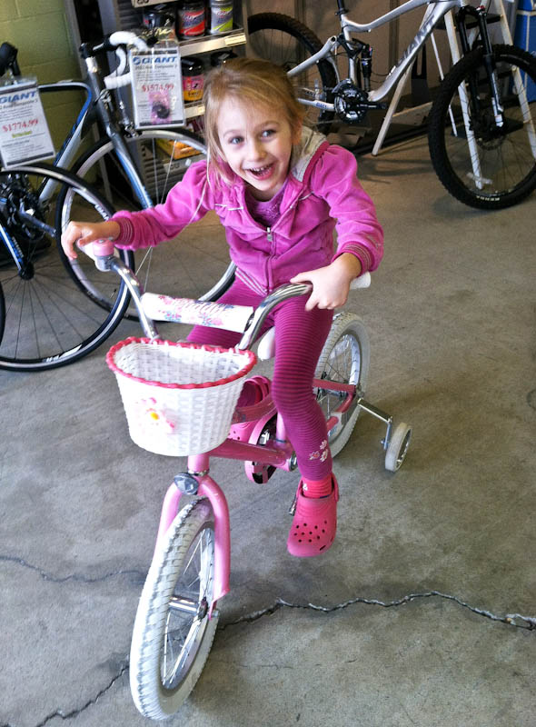Skylar riding pink bike 