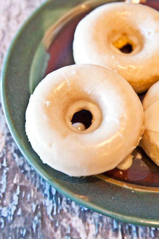 Baked Vanilla Glazed Donuts — Slightly dense and cake-like, these vanilla glazed donuts are baked rather than fried. Perfect for weekend brunches and special occasion breakfasts!