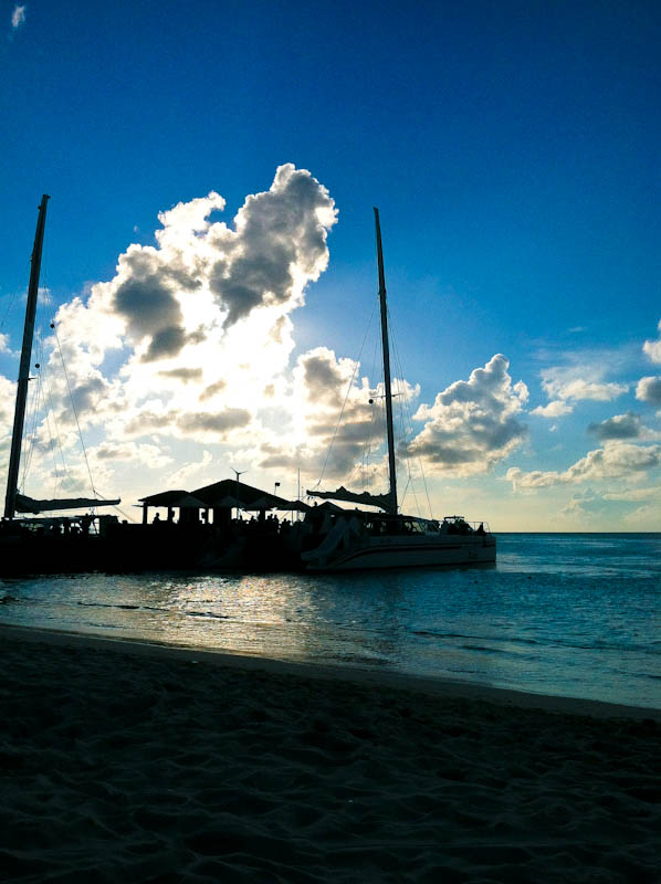 Aruba beach with umbrellas in distance