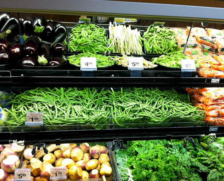 Grocery store shelves of vegetables