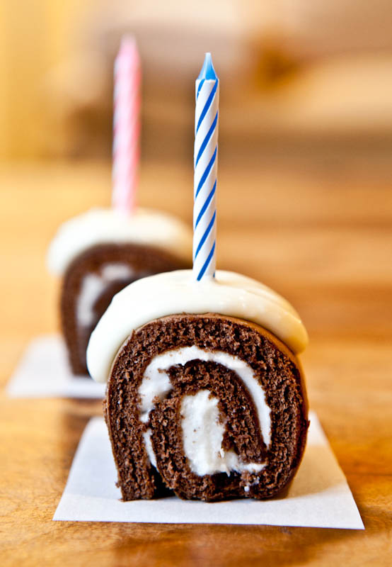 Ho-hos with cream cheese frosting and candles in them