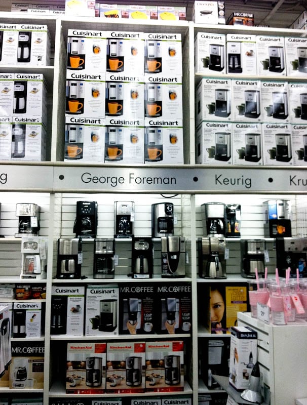bed bath and beyond store wall of coffee makers