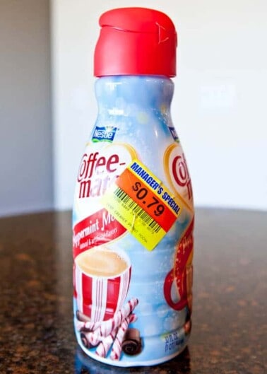 A bottle of nestlé coffee-mate peppermint mocha creamer with a discount sticker.