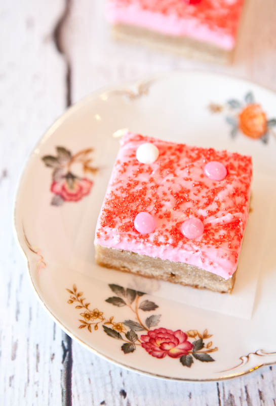 Snickerdoodle Cookie Bars with Pink Vanilla Cream Cheese Frosting