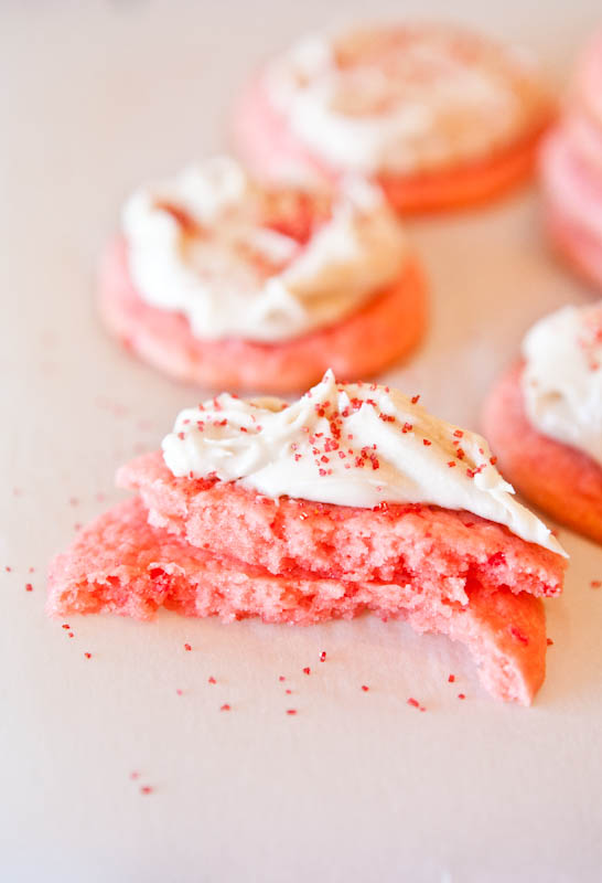 Strawberry Cake Mix Cookie with Vanilla Cream Cheese Frosting in half