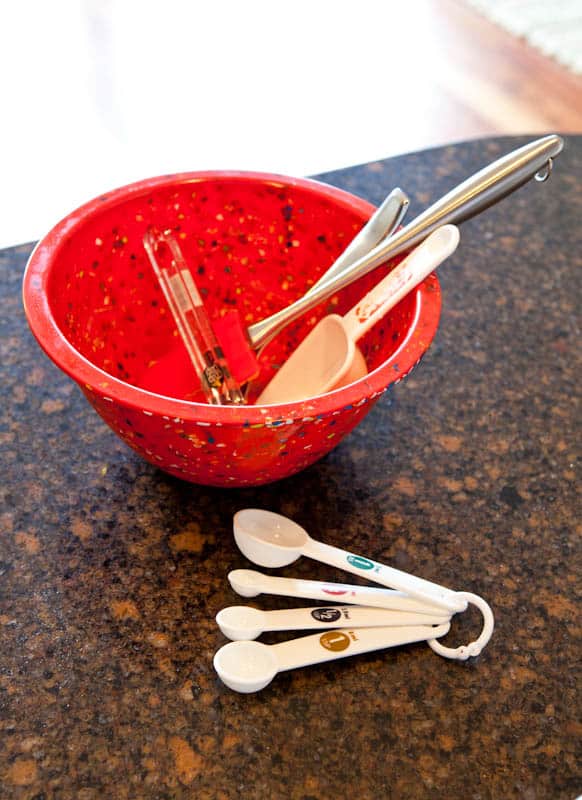 Mixing bowl with spatulas and measuring spoons