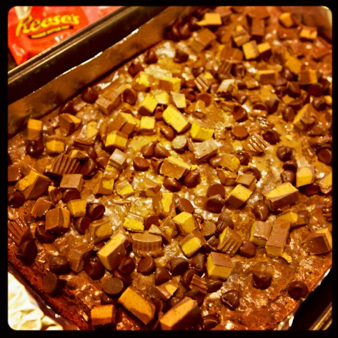 Reese's Peanut Butter Cups on top of brownie mix
