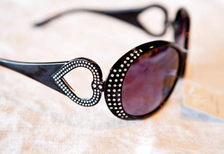 Sunglasses with rhinestones on frames and heart shaped ears