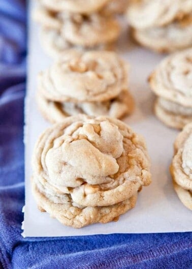 Freshly baked cookies on parchment paper.