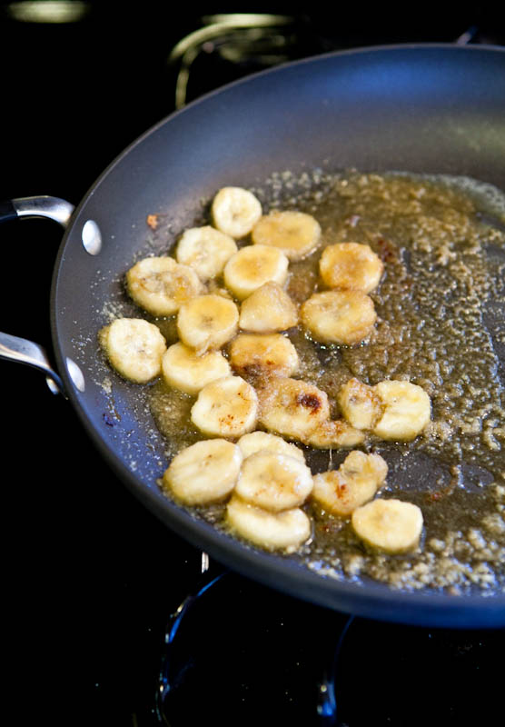 Bananas caramelizing in pan