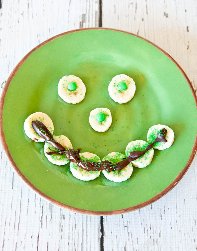 Green & Chocolate Drizzled Banana Smiley on green plate